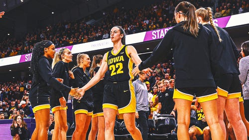 WOMEN'S COLLEGE BASKETBALL Trending Image: Caitlin Clark and Iowa are drawing sold-out crowds, big ratings even on road